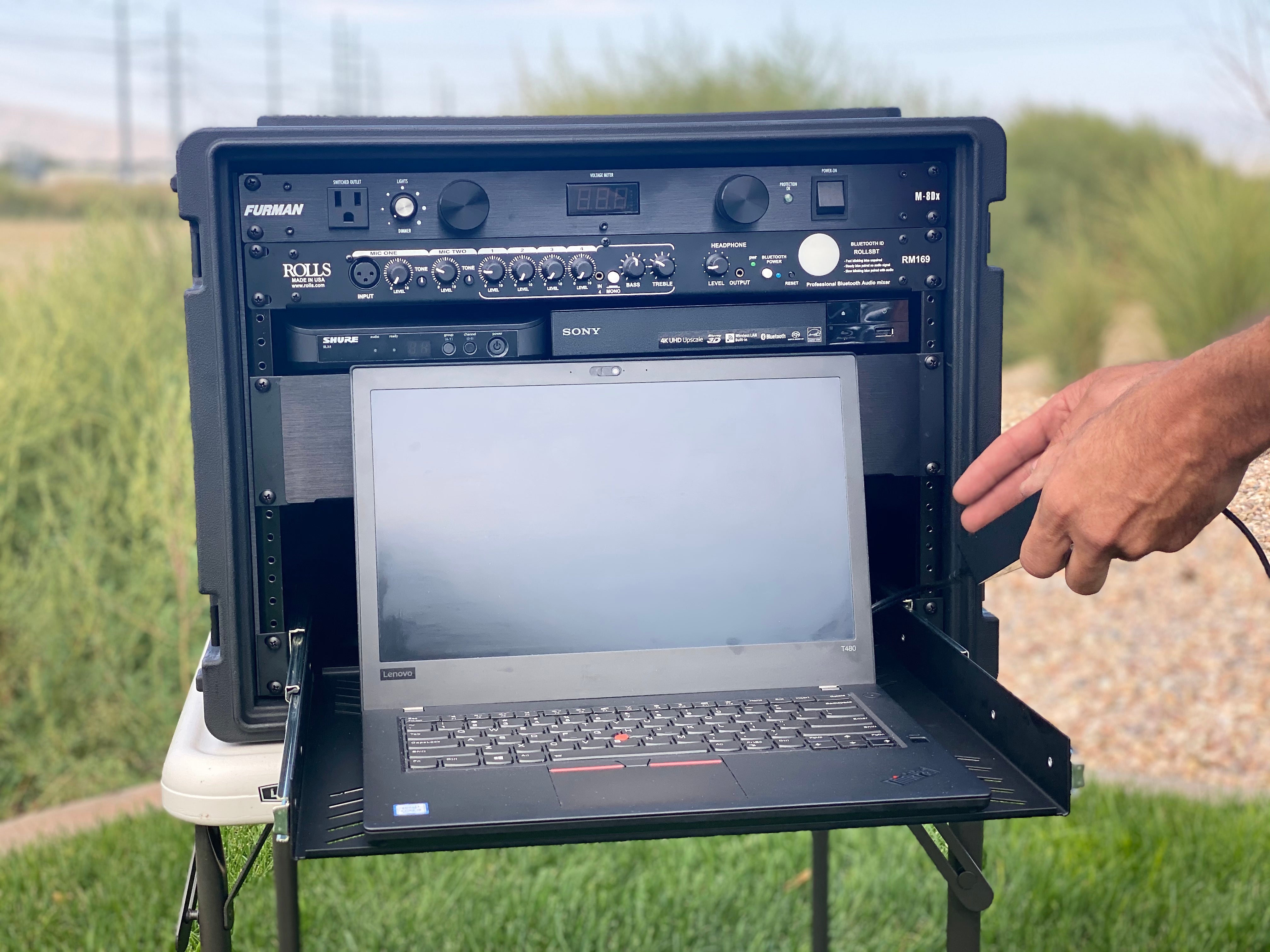 Open Air Cinema Cinebox™ media console with laptop shelf