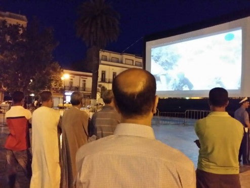 Projecting onto an Elite Open Air Cinema screen in Sidi Bel Abbès, western Algeria