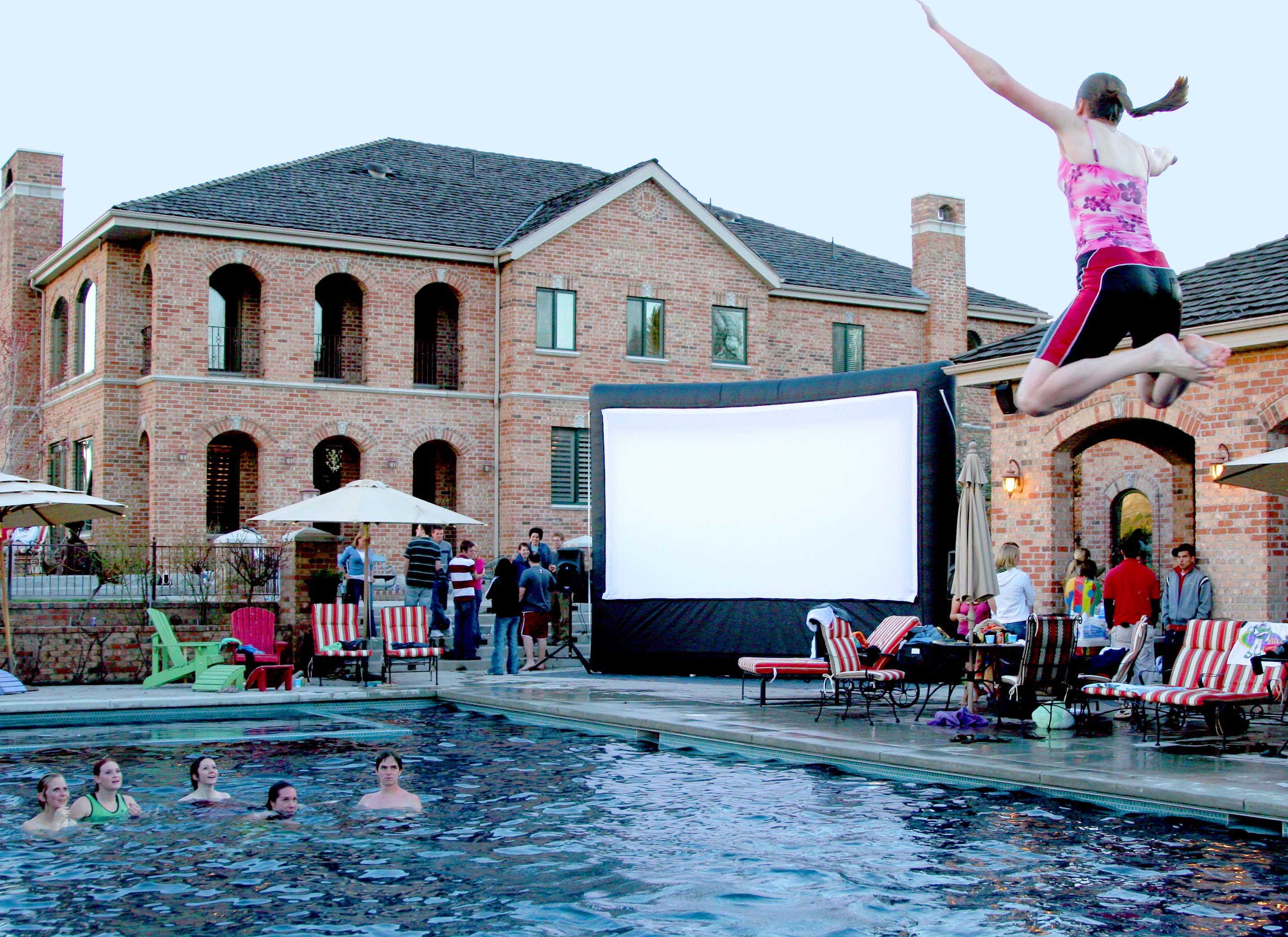 Movies By The Pool With The Cinebox Pro 16' Outdoor Movie System