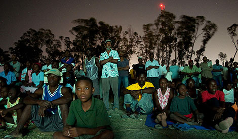 Hundreds of alfresco cinema-goers in Haiti watch a feature film shown as part of a project for youngsters set up by Bristol's Cube Cinema. Photograph: Cube Cinema
