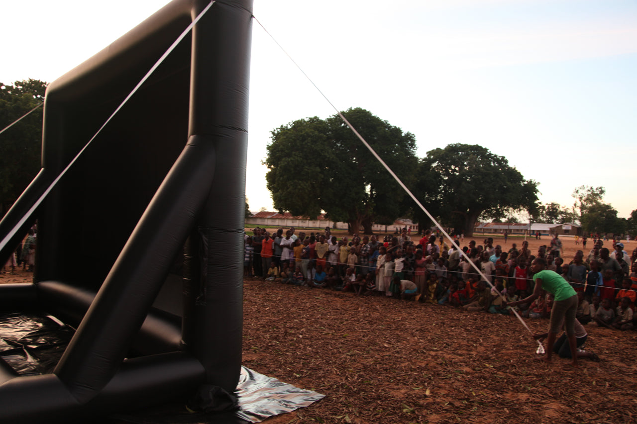 Open Air Cinema Pro 16' outdoor movie theater system in use