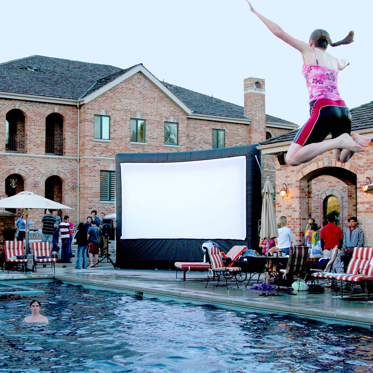 Open Air Cinema Pro 16' inflatable movie screen at an outdoor event