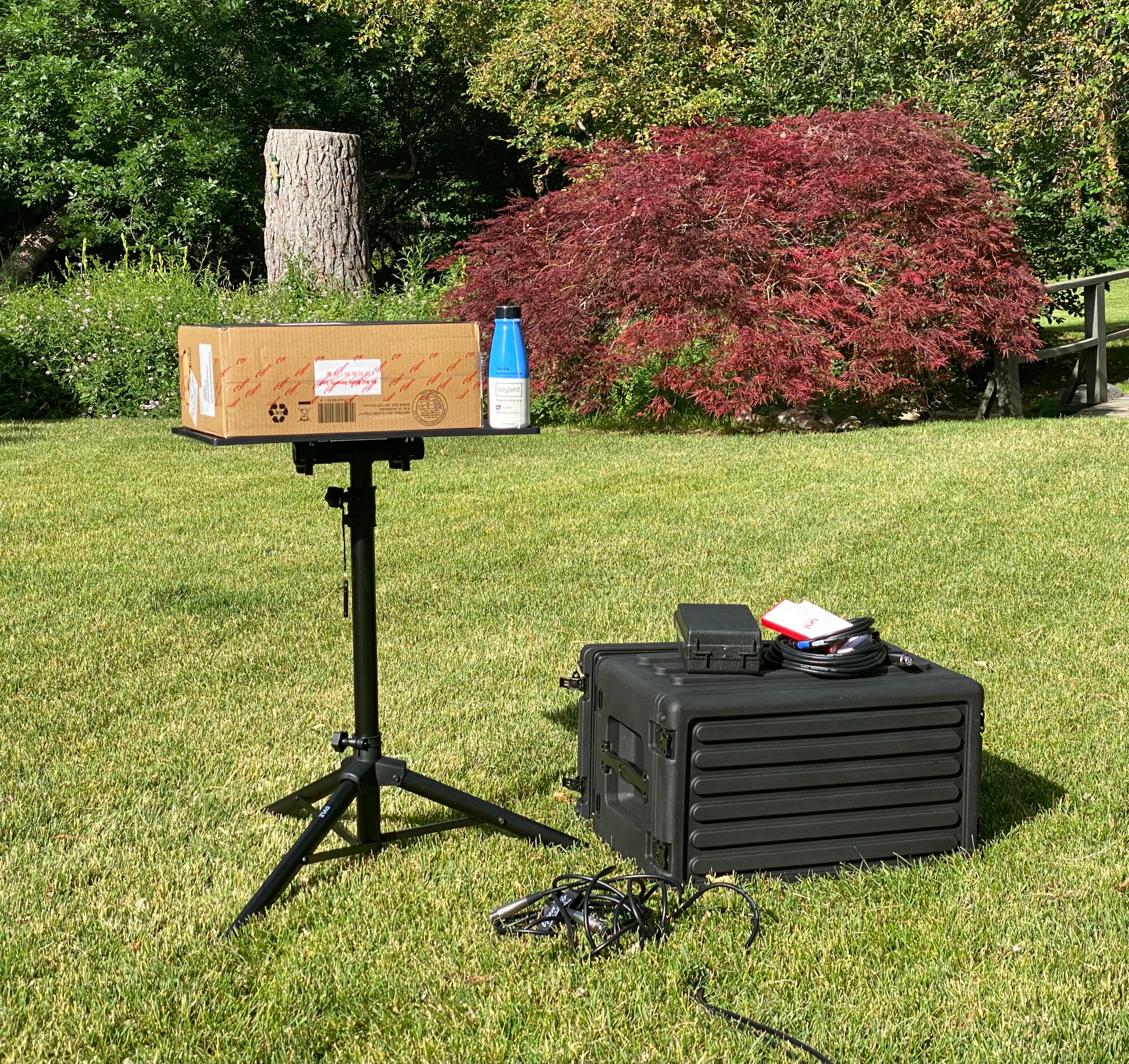 CineBox Pro 16' projector with tripod and carrying case