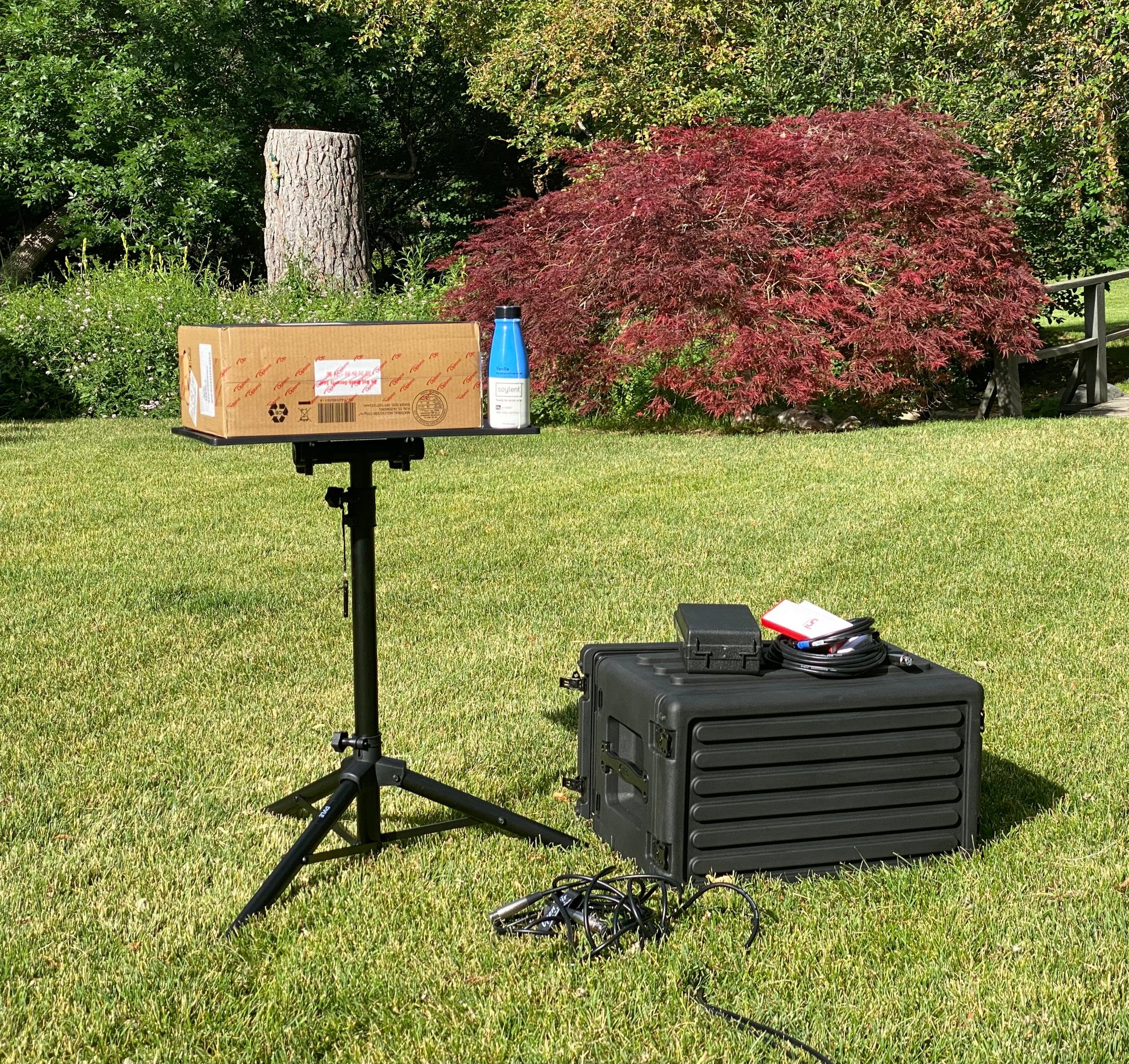 CineBox Pro 16' projector with tripod and carrying case